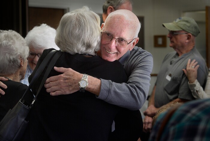 (Scott Sommerdorf | The Salt Lake Tribune) Robert "Bob" Sweet of Pennsylvania hugs one of his newfound cousins as the families gathered for a reunion, Thursday, November 9, 2017 at the Bountiful Tabernacle.