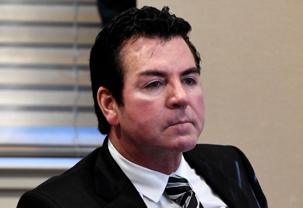FILE - In this Oct. 18, 2017, file photo, Papa John's founder and CEO John Schnatter attends a meeting in Louisville, Ky. Papa John’s plans to pull Schnatter’s image from marketing materials after reports he used a racial slur. Schnatter apologized Wednesday, July 11, and said he would resign as chairman after Forbes reported that he used the slur during a media training session. Schnatter had stepped down as CEO last year after criticizing NFL protests. (AP Photo/Timothy D. Easley, File)
