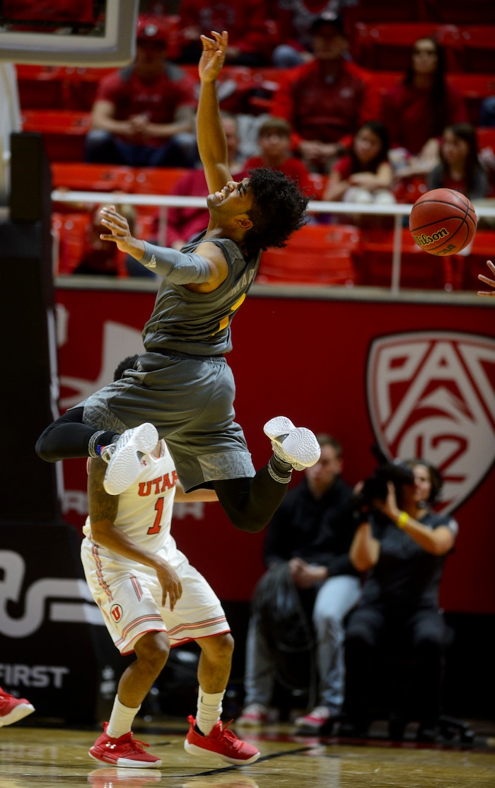 (Steve Griffin  |  The Salt Lake Tribune) Arizona State Sun Devils guard Remy Martin (1) gets the ball stripped away by Utah Utes guard Justin Bibbins (1) during the Utah Utes versus Arizona State Sun Devils at the Huntsman Center on the University of Utah campus in Salt Lake City Sunday January 7, 2018.