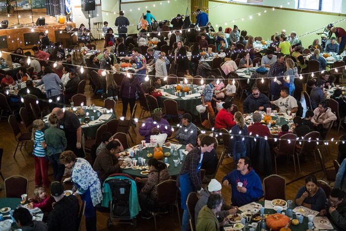 (Chris Detrick  |  The Salt Lake Tribune)  People eat during the annual Thanksgiving Day dinner at the Holy Trinity Cathedral in Salt Lake City  Thursday, November 23, 2017.  