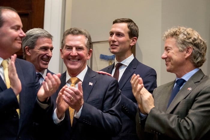 (AP Photo/Andrew Harnik) President Donald Trump's White House Senior Adviser Jared Kushner, second from right, smiles as Sen. Mike Lee, R-Utah, left, former Virginia Attorney General Ken Cuccinelli, second from left, former Sen. Jim DeMint of the Heritage Foundation, third from left, and Sen. Rand Paul, R-Ky., right, applaud as President Donald Trump recognizes Kushner as he speaks about H. R. 5682, the "First Step Act" in the Roosevelt Room of the White House in Washington, Wednesday, Nov. 14, 2018, which would reform America's criminal justice system.