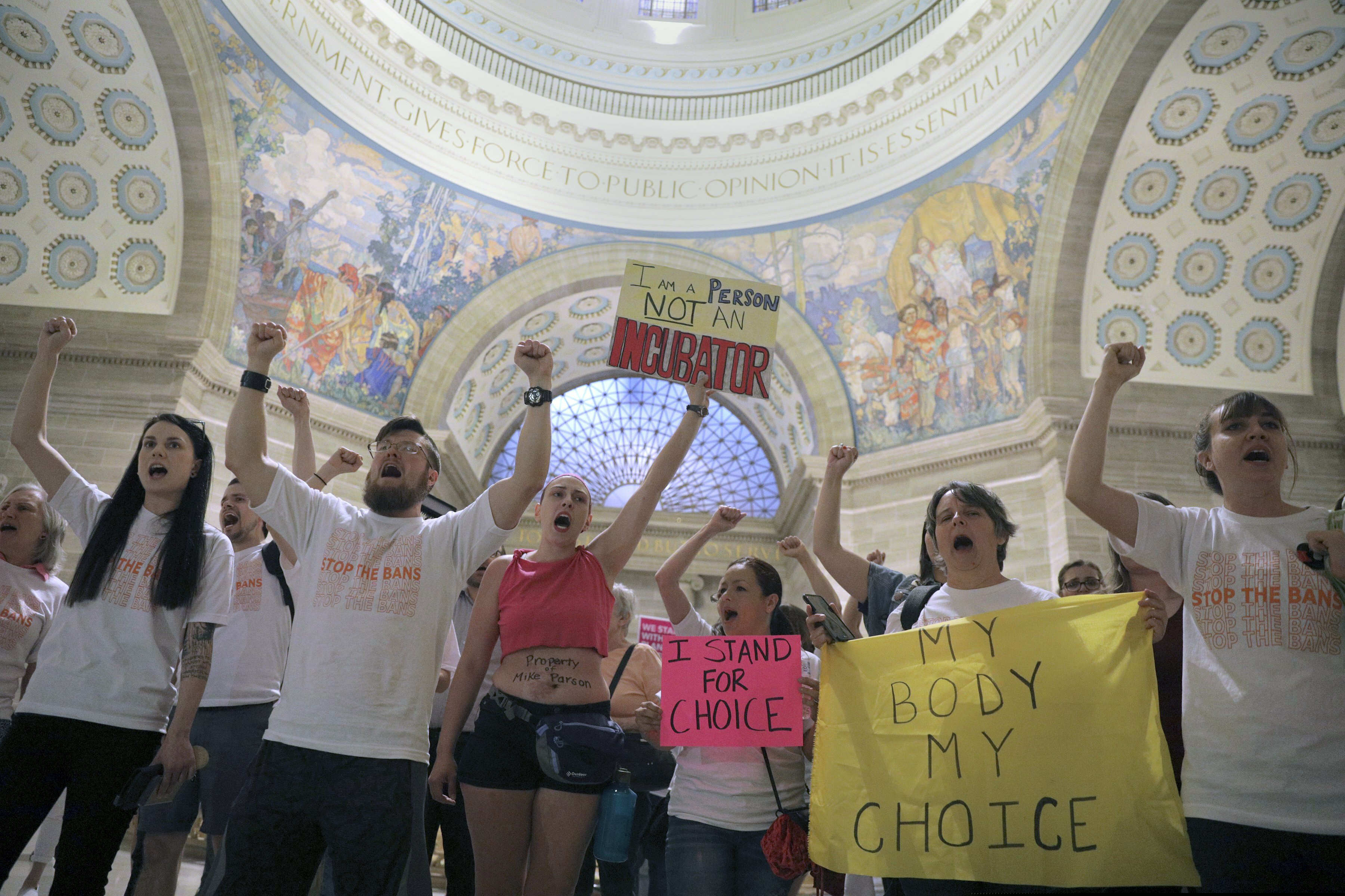 (Christian Gooden | St. Louis Post-Dispatch via AP) Abortion-rights activists react after lawmakers approved a sweeping piece of anti-abortion legislation, a bill that would ban most abortions in the state of Missouri, Friday, May 17, 2019 in Jefferson, Mo. If enacted, the ban would be among the most restrictive in the U.S. It includes exceptions for medical emergencies, but not for pregnancies caused by rape or incest. Doctors would face five to 15 years in prison for violating the eight-week cutoff. Women who receive abortions wouldn't be prosecuted.