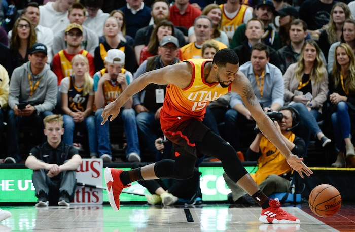 (Francisco Kjolseth  |  The Salt Lake Tribune)  Utah Jazz forward Derrick Favors (15) chases a ball down as the Utah Jazz host the Denver Nuggets in their NBA game at Vivint Smart Home Arena Tuesday, April 9, 2019, in Salt Lake City.