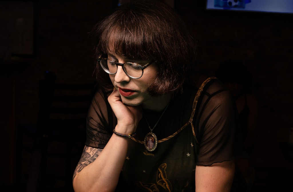 Siobhán Kirchstein, who transitioned in 2023, at a queer pool night at the Harbour Lights bar in Lawrence, Kan., in July 2026. (Anne Vetter/The New York Times) — NO SALES; FOR EDITORIAL USE ONLY WITH NYT STORY GESSEN COLUMN BY M. GESSEN FOR AUG. 13, 2026. ALL OTHER USE PROHIBITED. —