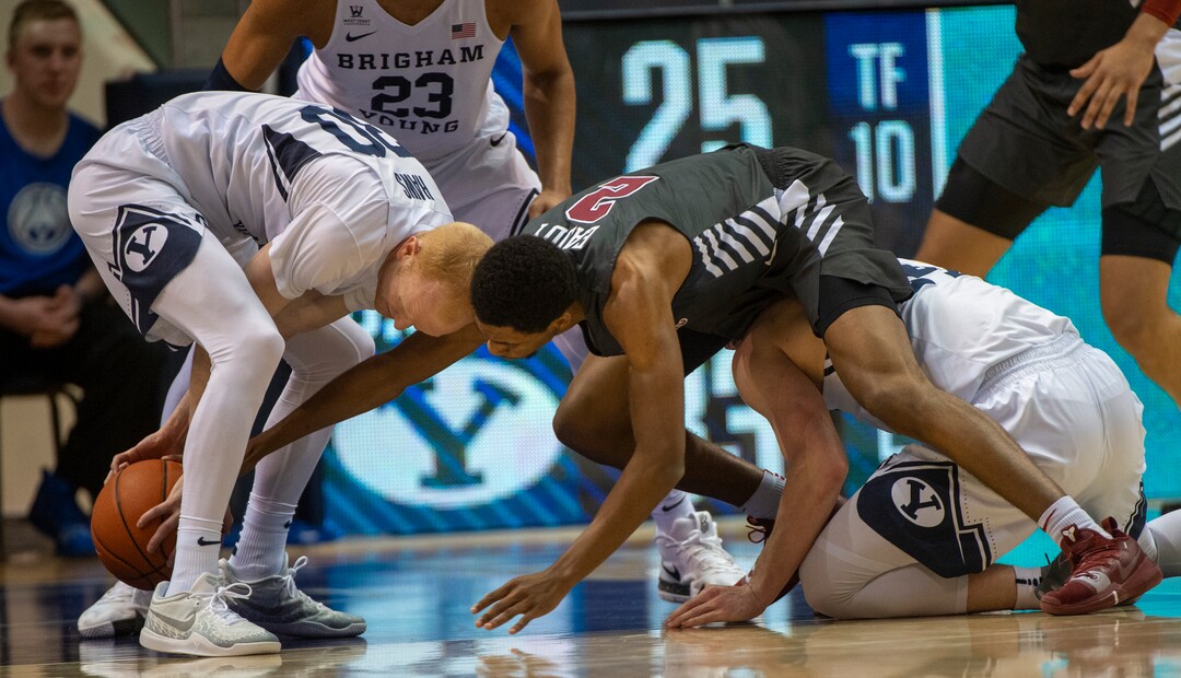 (Rick Egan  |  The Salt Lake Tribune)       Brigham Young Cougars guard TJ Haws (30) goes for a loose ball along with Santa Clara Broncos guard Tahj Eaddy (2), in basketball action between Brigham Young Cougars and Santa Clara Broncos at the Marriott Center in Provo, Saturday, Jan. 12, 2019.