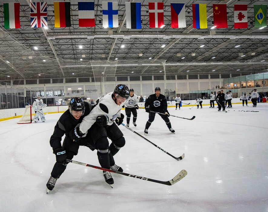 (Rick Egan | The Salt Lake Tribune)   Lleyton Moore (95) and Cameron Habig ((78) battle for position, during practice Utah Hockey Club practice, at the Olympic Oval in Kearns, on Thursday, Sept. 19, 2024. 