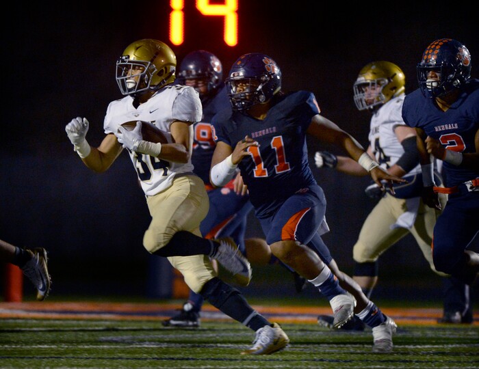 (Scott Sommerdorf   |  The Salt Lake Tribune)   
Skyline RB Sainone Matagi runs the ball to the Brighton one yard line late in the first half. A very short field goal was later missed keeping Skyline's 14-10 lead at the half over Brighton, Friday, September 15, 2017.