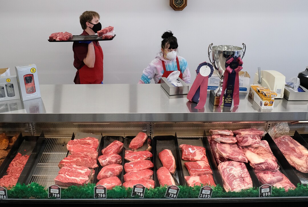 (Francisco Kjolseth  |  The Salt Lake Tribune) A steady stream of customers visits Snider Brothers Meats in Cottonwood Heights on Tuesday, May 5, 2020, where owners Will and Amy Wilson, have been requiring that all customers wear masks or facial coverings when they come to shop. Some specialty items are not available due to the demand created by the coronavirus pandemic.