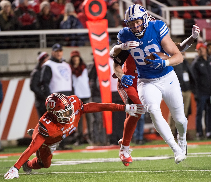(Rick Egan  |  The Salt Lake Tribune)  BYU tight end Matt Bushman (89) played in this game against Utah with a torn labrum in his shoulder, then had surgery after the bowl game in mid-December. The junior is one of four BYU tight ends sitting out spring practices, but expect to return to action soon.