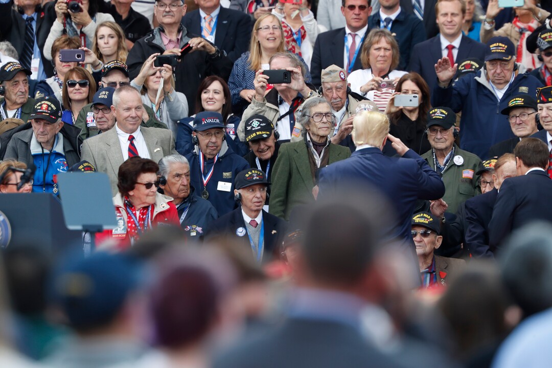 (Thibault Camus | AP) U.S. President Donald Trump salutes to veterans prior to a ceremony to mark the 75th anniversary of D-Day at the Normandy American Cemetery in Colleville-sur-Mer, Normandy, France, Thursday, June 6, 2019. World leaders are gathered Thursday in France to mark the 75th anniversary of the D-Day landings.
