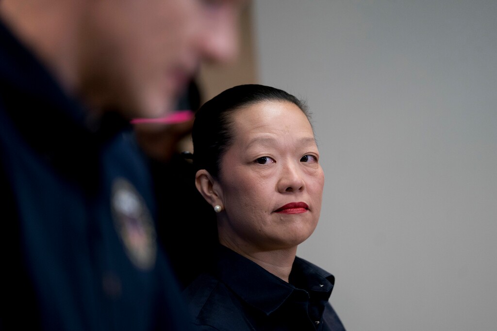 (Andrew Harnik | The Associated Press) National Transportation Safety Board member Bella Dinh-Zarr arrives at a news conference at the National Transportation Safety Board headquarters in Washington, Monday, Dec. 18, 2017.