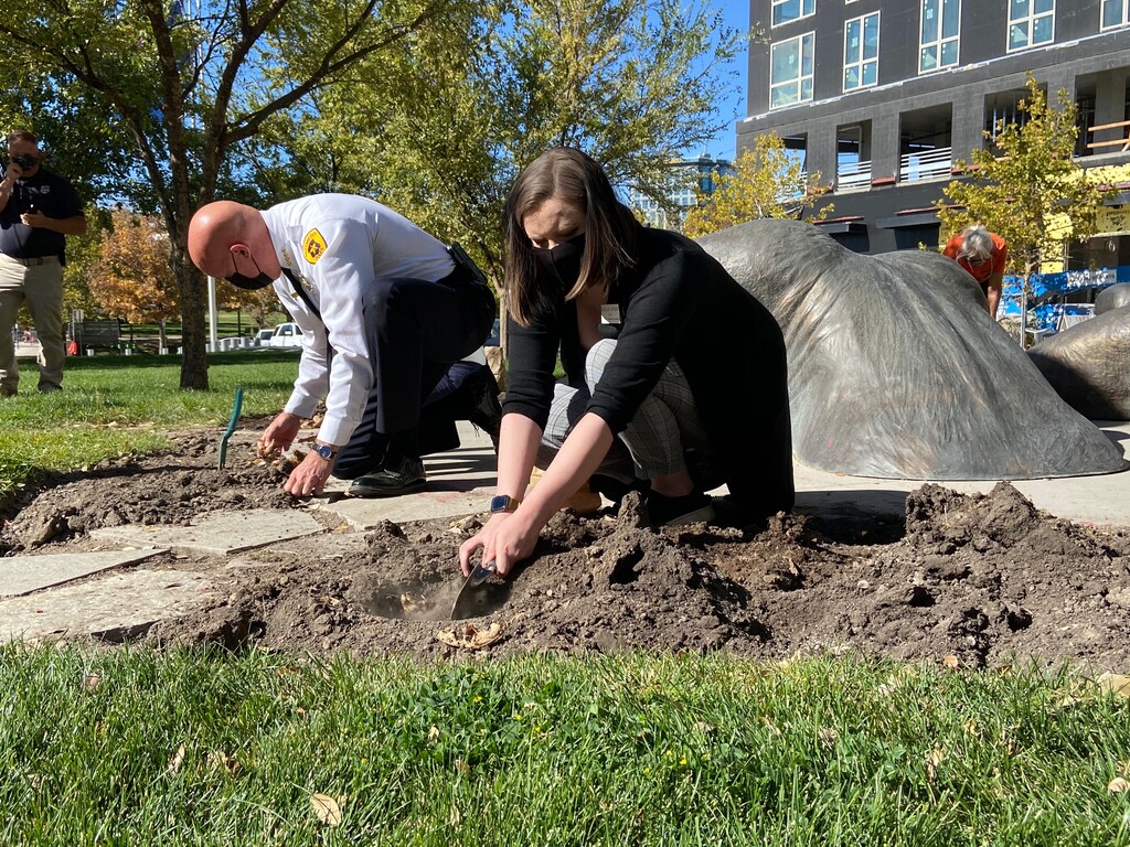 (Salt Lake City Police | Courtesy photo) Salt Lake City Police Chief Mike Brown and Mayor Erin Mendenhall plant daffodils in front of the Salt Lake Public Safety Building, Wednesday, Oct. 21, 2020, in honor of survivors of domestic violence. The event was designed to draw attention to the YWCA's global Week Without Violence campaign.