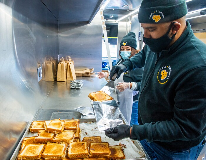 (Rick Egan | The Salt Lake Tribune)  makes grilled cheese sandwiches for 600 health care workers as part of the the Curds + Kindness program, which supports local dairy farmers, at the South Jordan Health Center in Daybreak on Tuesday, Dec. 1, 2020.