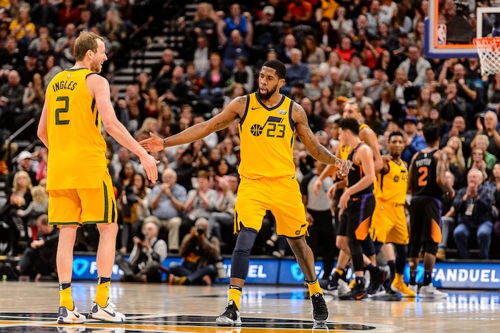 (Trent Nelson | The Salt Lake Tribune)  Utah Jazz forward Royce O'Neale (23) celebrates a shot at the end of the first half giving the Jazz a 50-41 lead. Utah Jazz host the Phoenix Suns, NBA basketball in Salt Lake City, Wednesday Feb. 14, 2018. Utah Jazz forward Joe Ingles (2) at left.