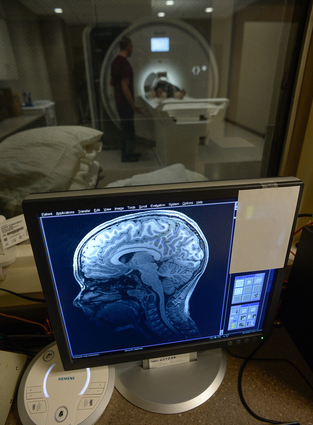 Francisco Kjolseth | The Salt Lake TribuneBryce Hortin, 11, of Syracuse is positioned in the machine that will periodically capture images of his brain over a 10-year study. At the U of U, psychology professor Deborah Yurgelun-Todd aims to enroll 1,000 Utahns into a study that will ultimately include 12,000 across the country to monitor kids in their preteen and teen years.