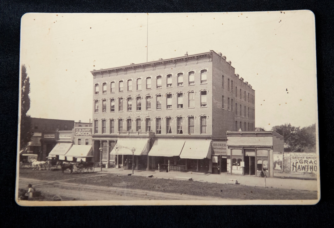 (Jeremy Harmon  |  The Salt Lake Tribune) This 1880s photograph of Salt Lake City's Walker Building (not to be confused with the Walker Bank Building that was built in the early 1900s) was found in a time capsule that was buried in the corner stone of Ogden Academy on September 27, 1887. Items from the time capsule were displayed at the Utah State Archives on Wednesday, Oct. 16, 2019.