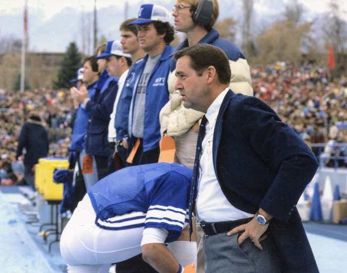 (The Church of Jesus Christ of Latter-day Saints) Jeffry R. Holland watches a BYU football game while serving as president of the university.
