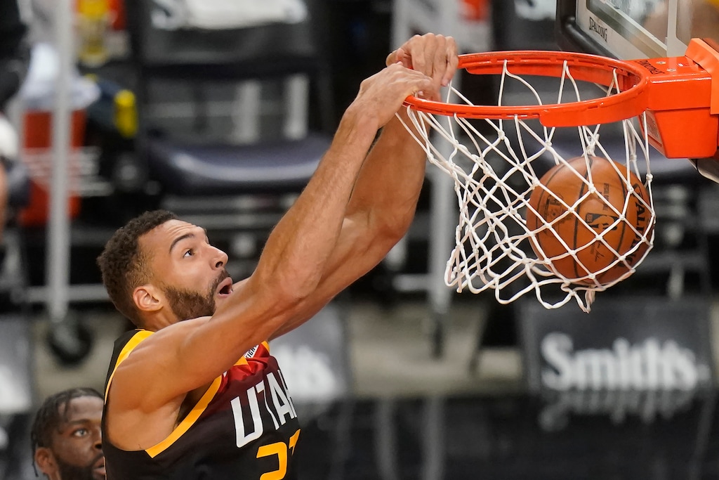 (Rick Bowmer | The Associated Press) Utah Jazz center Rudy Gobert dunks against the Orlando Magic in the first half during an NBA basketball game Saturday, April 3, 2021, in Salt Lake City.