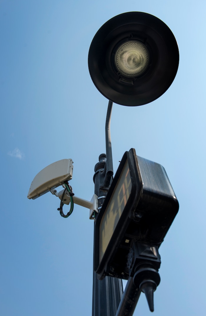 (Rick Egan  |  The Salt Lake Tribune)      The white box on the left is one of ten traffic signal detectors, Salt Lake City has installed, that uses a radar device that is triggered by people riding bicycles. Wednesday, Aug. 1, 2018.


