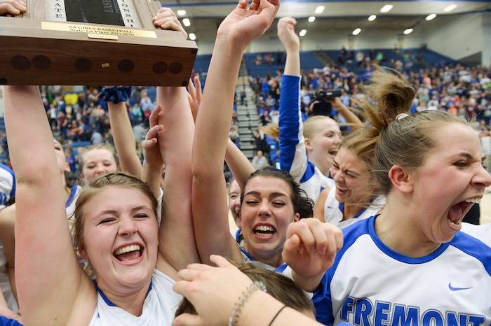 (Leah Hogsten  |  The Salt Lake Tribune) Fremont celebrates the win. Fremont defeated Bingham 61-47 to win the 6A High School Girls' Basketball Tournament title at SLCC in Taylorsville,Saturday, Feb. 24, 2018. 