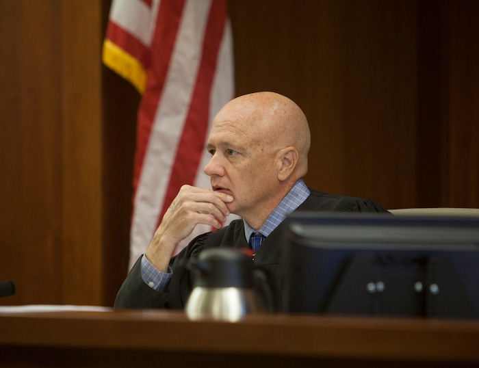 (Chris Caldwell  |  Pool Photo)  Judge Paul Dame during the detention hearing and initial appearance for the 16-year-old boy accused of bringing a bomb to Pine View High School Wednesday, March 28, 2018.