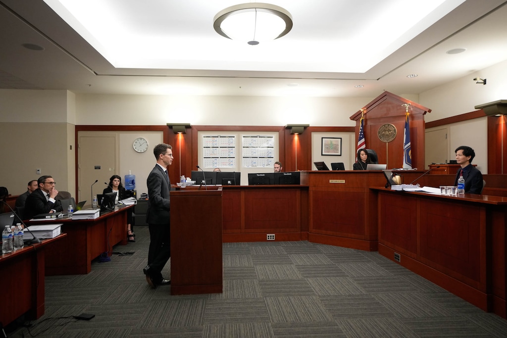 (Francisco Kjolseth | The Salt Lake Tribune) Soren Geiger, attorney for the Utah Legislature, cross-examines witness Jowei Chen, associate professor at the University of Michigan, during a hearing regarding congressional district maps before Judge Dianna Gibson in 3rd District Court in Salt Lake City on Thursday, Oct. 23, 2025.