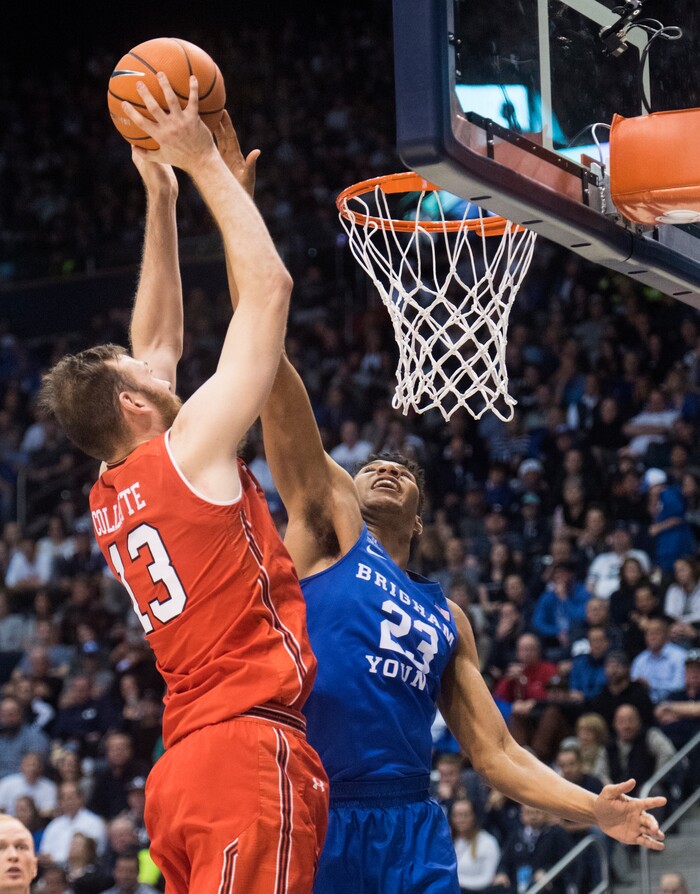 (Rick Egan  |  The Salt Lake Tribune)   Brigham Young Cougars forward Yoeli Childs (23) stops Utah Utes forward David Collette (13) from scoring, in basketball action Utah Utes vs. Brigham Young Cougars at the Marriott Center in Provo, Saturday, December 15, 2017.


