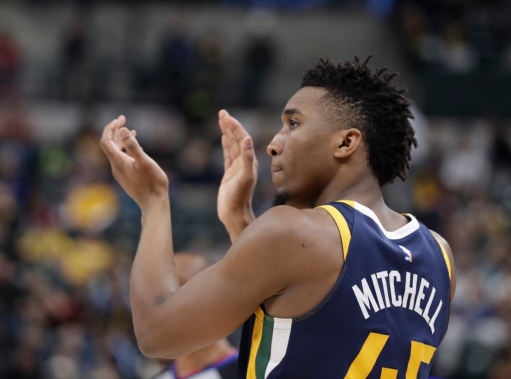 Utah Jazz's Donovan Mitchell encourages his teammates during the second half of an NBA basketball game against the Indiana Pacers on Wednesday, March 7, 2018, in Indianapolis. Utah won 104-84. (AP Photo/Darron Cummings)