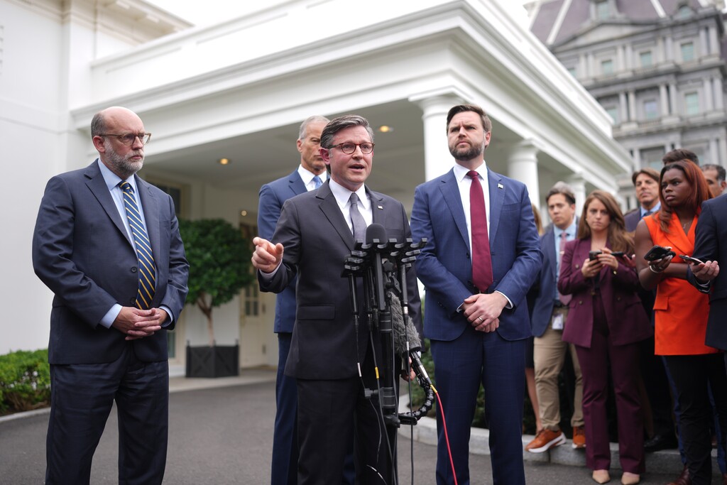 (Doug Mills | The New York Times) House Speaker Mike Johnson, R-La., speaks to reporters after meeting with President Donald Trump and Congressional leaders at the White House in Washington, on Monday, Sept. 29, 2025. The top four congressional leaders gathered with President Trump on Monday, but with both sides dug in, there appeared to be little chance of a breakthrough to avoid a shutdown. From left: Russell Vought, director of the Office of Management and Budget; Senate Majority Leader John Thune, R-S.D.; Johnson; and Vice President JD Vance.