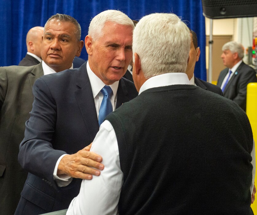 (Rick Egan  |  Tribune file photo)   Vice President Mike Pence greets Rep. Rob Bishop after speaking at Merit Medical, Thursday, Aug. 22, 2019.