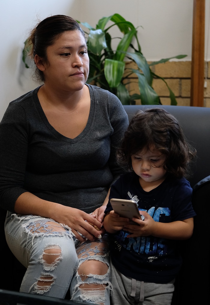 (Francisco Kjolseth  |  The Salt Lake Tribune)  Monse Palestina, 29, who was 8-years-old when she was brought into the country illegally expresses her concern over the end of the DACA program alongside her son Erik, 2, one of her three children during a visit to the Mexican Consulate on Tuesday, Sept. 12, 2017. The Mexican Consulate is currently offering free legal advice to DACA recipients, particularly the ones who need to renew it by the Oct. 5 deadline, and is covering the government fee to reapply before the deadline. 
