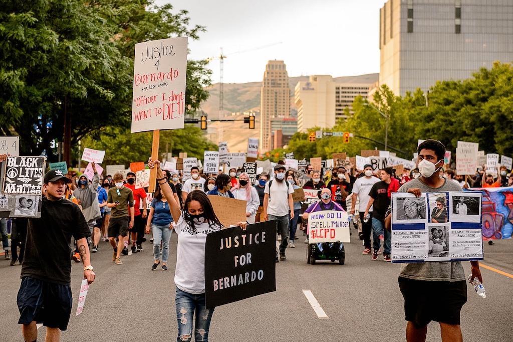 (Trent Nelson  |  The Salt Lake Tribune) People march against police brutality in Salt Lake City on Saturday, June 13, 2020.