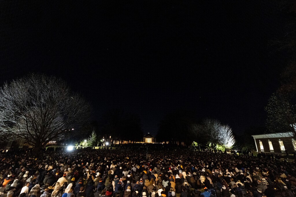 (Mike Kropf/The Daily Progress via AP) Students participate in a vigil in response to shootings that happened on the University of Virginia campus the night before in Charlottesville, Va., on Monday, Nov. 14, 2022.
