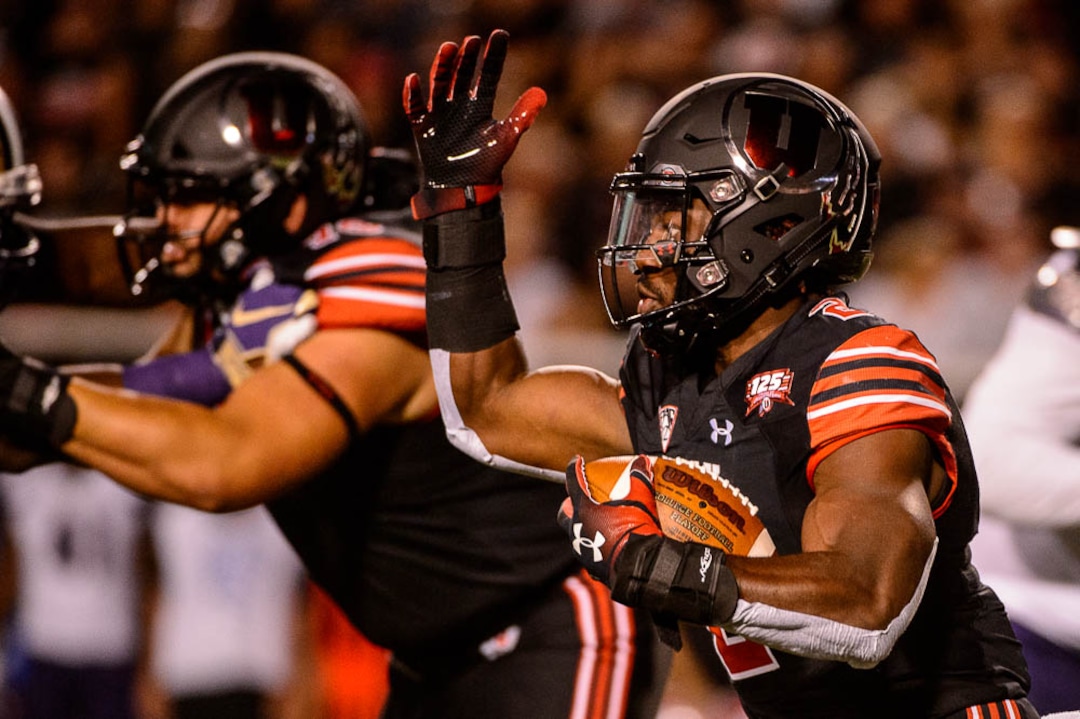 (Trent Nelson | The Salt Lake Tribune)  Utah Utes running back Zack Moss (2) runs the ball as the University of Utah hosts Washington at Rice-Eccles Stadium in Salt Lake City, Saturday Sept. 15, 2018.