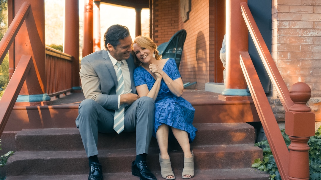 (Photo courtesy Pinnacle Peak Pictures) Mr. March (Bart Johnson, left) and Marmee (Lea Thompson) embrace before a family wedding, in a scene from  director Clare Niederpruem's modern-day adaptation of Louisa May Alcott's "Little Women."