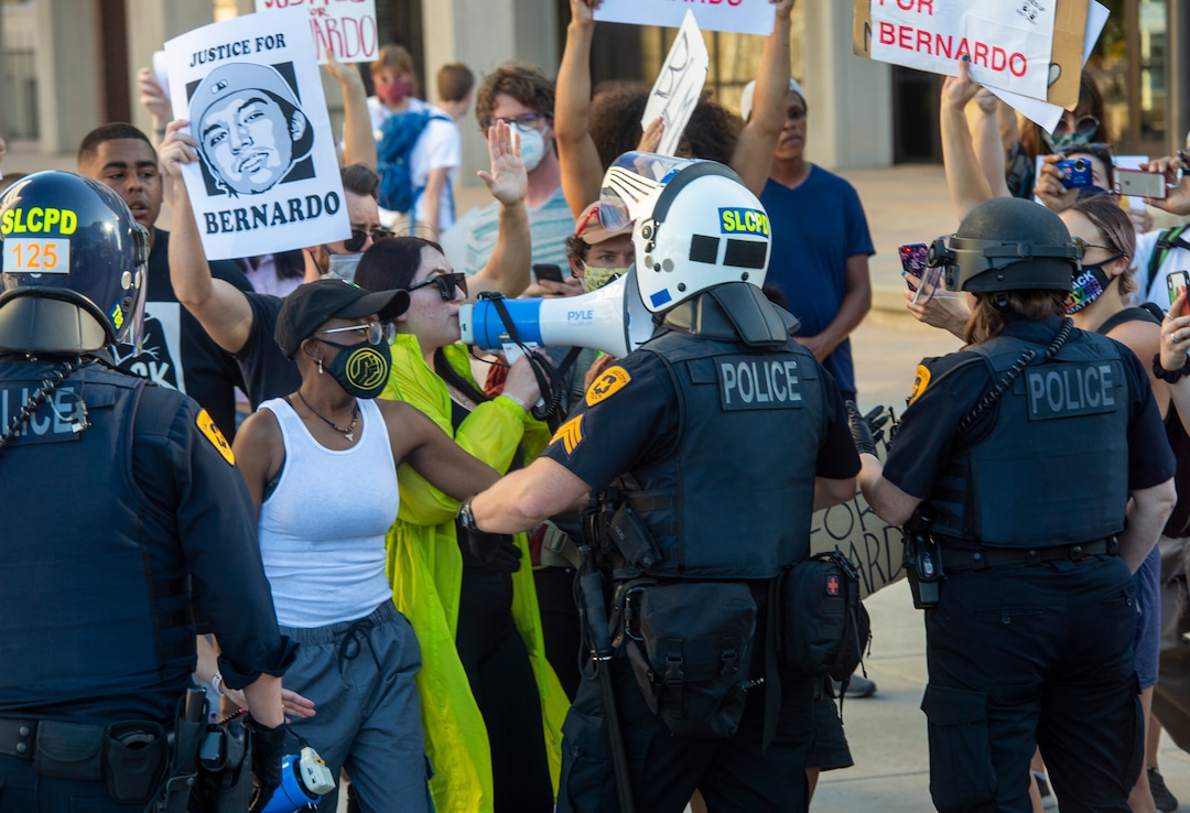 (Rick Egan  |  The Salt Lake Tribune) Protesters face off with the Salt Lake City Police, who threatened to arrest anyone who stepped off of the sidewalk during a Justice for Bernardo Palacios march in Salt Lake City on Tuesday, June 23, 2020.