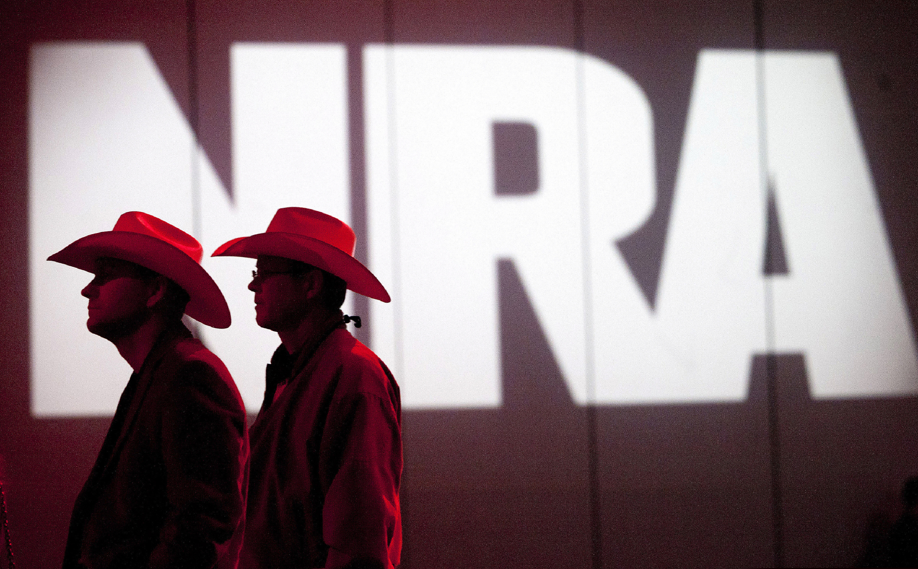 (Johnny Hanson | Houston Chronicle via AP, File) In this May 4, 2013, photo, National Rifle Association members listen to speakers during the NRA's annual Meetings and Exhibits at the George R. Brown Convention Center in Houston. The Los Angeles City Council, Tuesday, Jan. 21, 2020 repealed a law requiring companies that want city contracts to disclose whether they have ties to the NRA. The 12-0 vote comes weeks after a judge blocked the city from enforcing the ordinance.