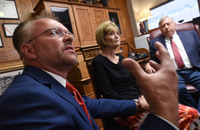 (Francisco Kjolseth  |  The Salt Lake Tribune)  Grant Stanfield and his mother Connie Elison, left, brother and mother of Thomas Stanfield who was shot and killed by a Citadel security guard last week, speak with the press at the office of their attorney, Robert Sykes, at right, in Salt Lake City on Tuesday, June 26, 2018, after filing a civil rights and wrongful death law suit.