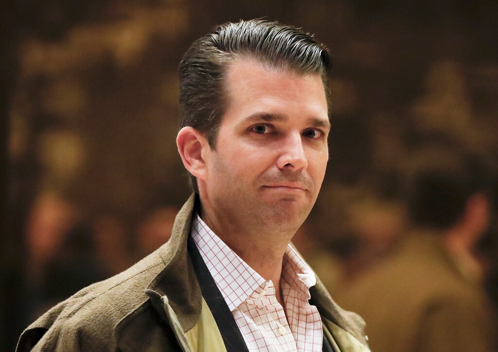 (Carolyn Kaster | The Associated Press) In a Wednesday, Nov. 16, 2016 file photo, Donald Trump Jr., son of President Donald Trump, walks from the elevator at Trump Tower, in New York.  Trump Jr. told the Senate Judiciary Committee that he couldn't remember whether he had discussed the Russia investigation with his father, according to transcripts released Wednesday of his interview with the panel.