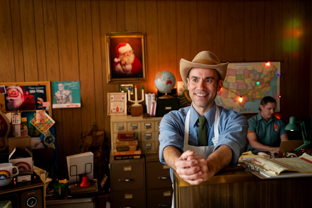 (Rick Egan | The Salt Lake Tribune) Tru-Tone owner David Andora in the company's show room in Ogden, on Wednesday, Dec. 10, 2025. His husband, Sean Hunt, who also runs the business, sits at his desk.

