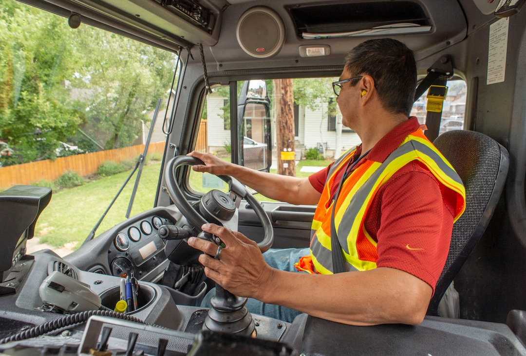 (Rick Egan  |  The Salt Lake Tribune) Steve Reyes, collects recycled material in Sugarhouse for the Wasatch Front Waste and Recycling District on Friday, July 26, 2019.