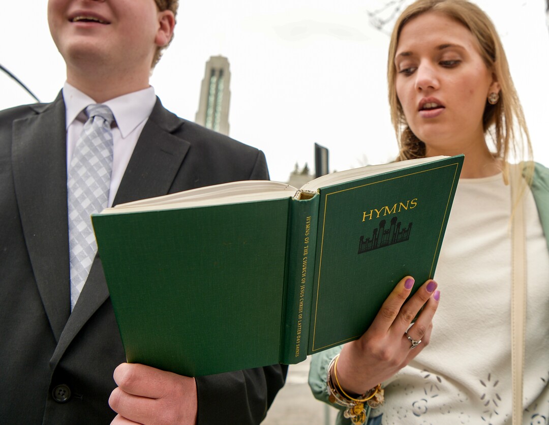 Leah Hogsten  |  The Salt Lake Tribune  Andrew Hendricks and Rachel Hedin sing hyms outside the Conference Center prior to the afternoon session of the 189th Annual General Conference of The Church of Jesus Christ of Latter-day Saints, April 6, 2019 in Salt Lake City. 