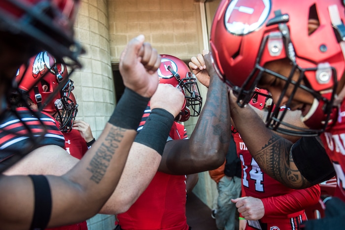 (Chris Detrick  |  The Salt Lake Tribune)  Utah Utes quarterback Tyler Huntley (1) and his teammates huddle before the game at Rice-Eccles Stadium Saturday, October 21, 2017. 