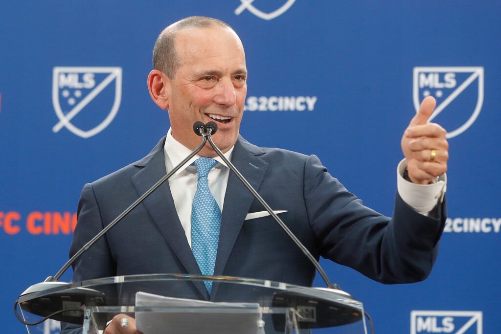 Major League Soccer Commissioner Don Garber speaks during an event to announce the addition of FC Cincinnati as an MLS expansion team, Tuesday, May 29, 2018, at Rhinegeist Brewery in Cincinnati.Major League Soccer added Cincinnati in its latest round of expansion Tuesday, rewarding a city that has set attendance records during three seasons of United Soccer League play and has a stadium deal in place.
¶   The announcement on Tuesday brings MLS to 26 teams, two shy of its ultimate goal. It began as a 10-team league in 1996.
¶   Cincinnati will join next year, continuing to play at the University of Cincinnati's football stadium while a 21,000-seat soccer stadium is built in the city's low-income West End neighborhood. The stadium is expected to be ready for the 2021 season.