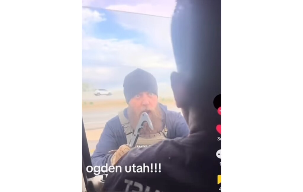 (Screenshot) An agent with U.S. Immigration and Customs Enforcement worked with a Utah Highway Patrol trooper on Monday, March 30, 2026, to arrest three individuals near Ogden. The screenshot comes from a video taken by one of the individuals and posted on social media.