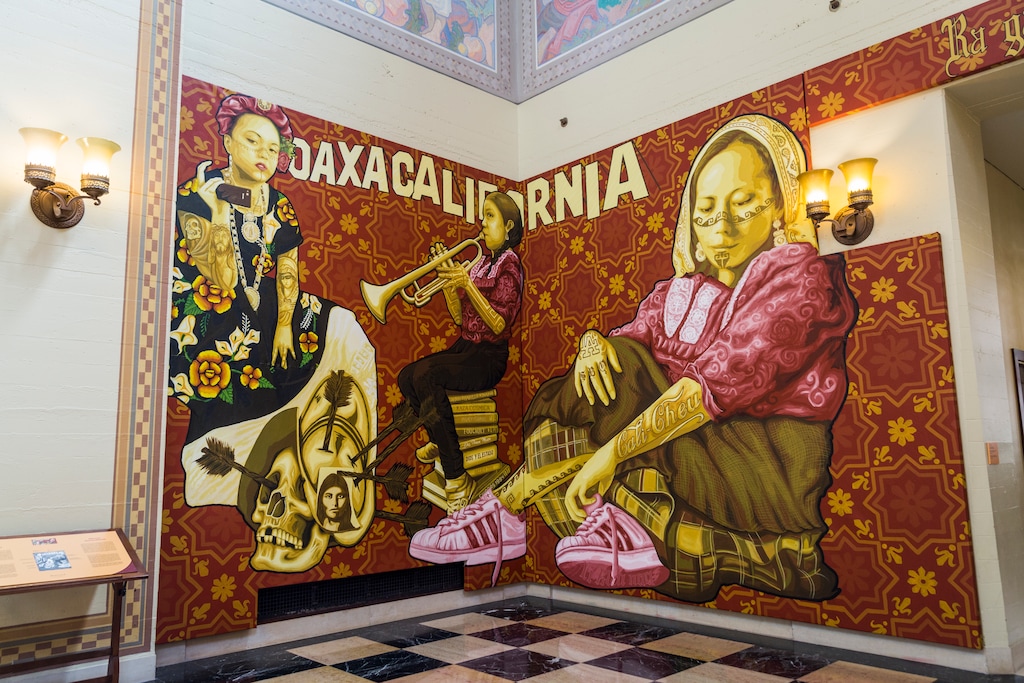 (Emily Berl/The New York Times)

A detail of the murals by the Oaxacan artist collective Tlacolulokos in a public library in Los Angeles in 2017.