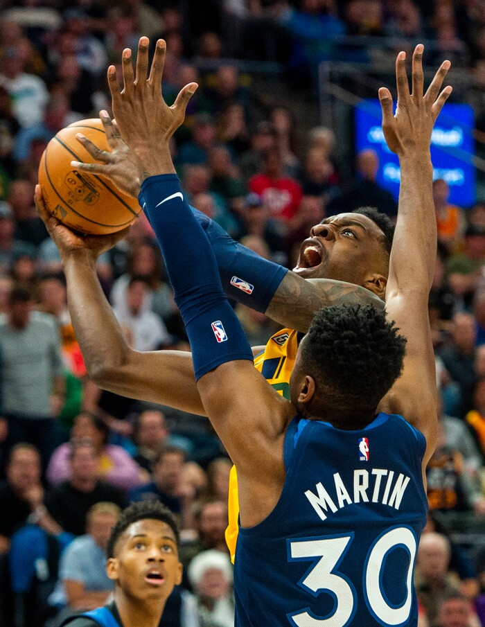(Rick Egan  |  The Salt Lake Tribune)     Utah Jazz forward Jeff Green (22) goes up for a shot as Minnesota Timberwolves forward Kelan Martin (30) defends, in NBA action between the Utah Jazz and the Minnesota Timberwolves in Salt Lake City, Monday, Nov. 18, 2019.