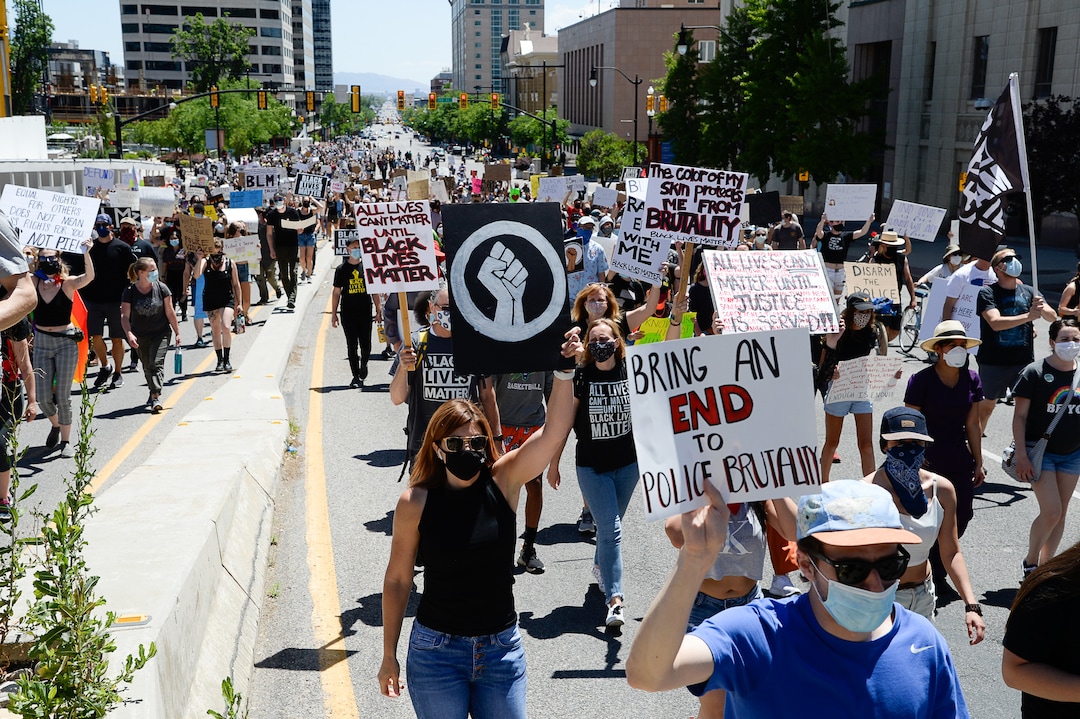 (Francisco Kjolseth  |  The Salt Lake Tribune) Demonstrators march the streets of downtown Salt Lake City for a protest as part of a series of Juneteenth celebrations on Friday, June 19, 2020.