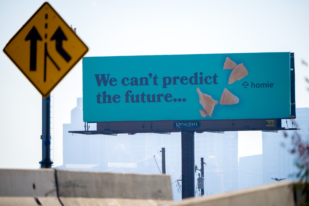 (Trent Nelson | The Salt Lake Tribune) A billboard for the real estate company Homie, along Interstate 15 in Salt Lake City on Nov. 22, 2023.