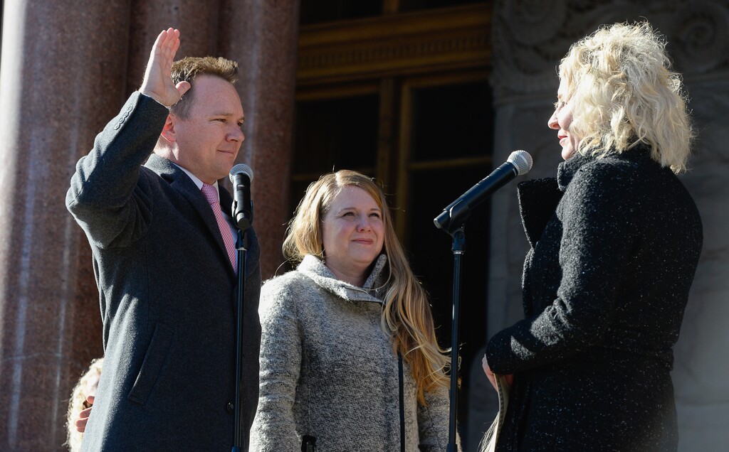(Francisco Kjolseth | Salt Lake Tribune file photo) Andrew Johnston, joined by his wife, Clarisa, was sworn in as District 2 Councilman by City Recorder Cinci Mansell during inauguration ceremonies at Salt Lake City Hall on Monday, Jan. 6, 2020. Johnston announced last week that he would resign his council seat to serve as the city's homelessness policy and outreach director.